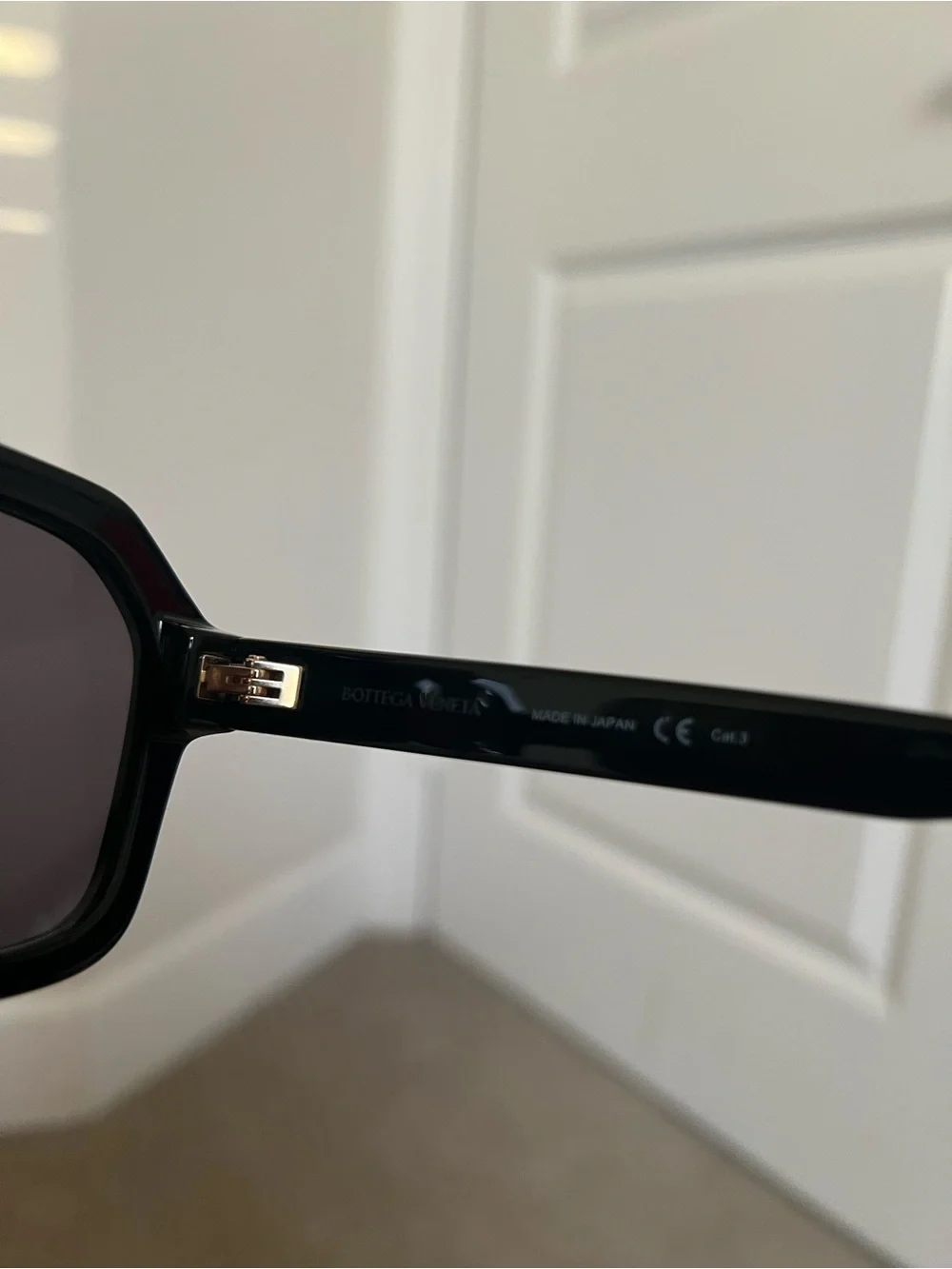Bottega Veneta Black Sunglasses with Gold Accents